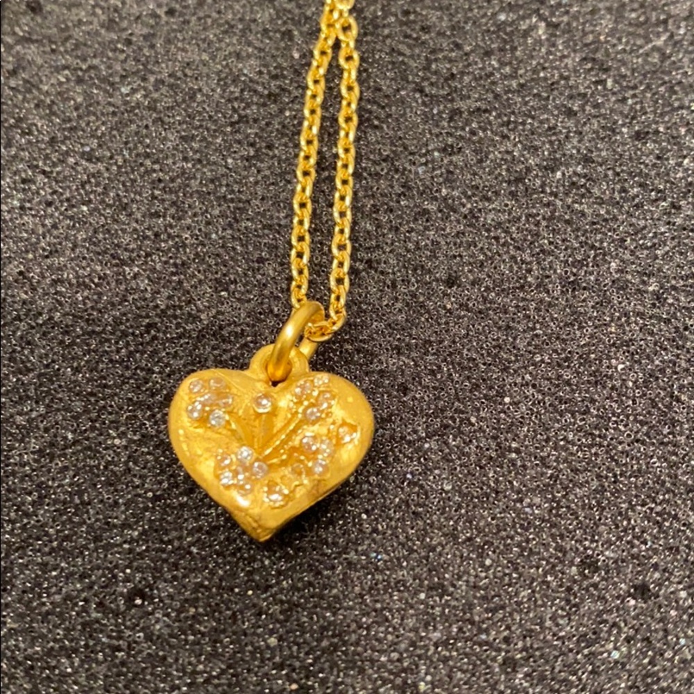 Gold tone Heart necklace w crystals. 18” chain